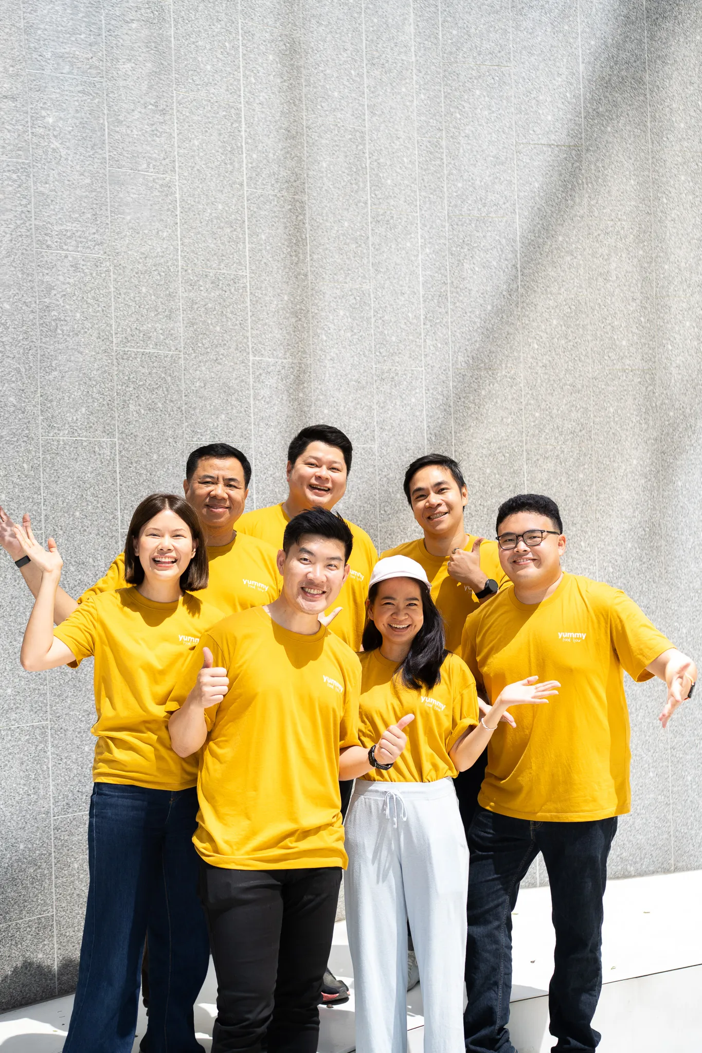 The Yummy Food Tour team in their yellow shirts